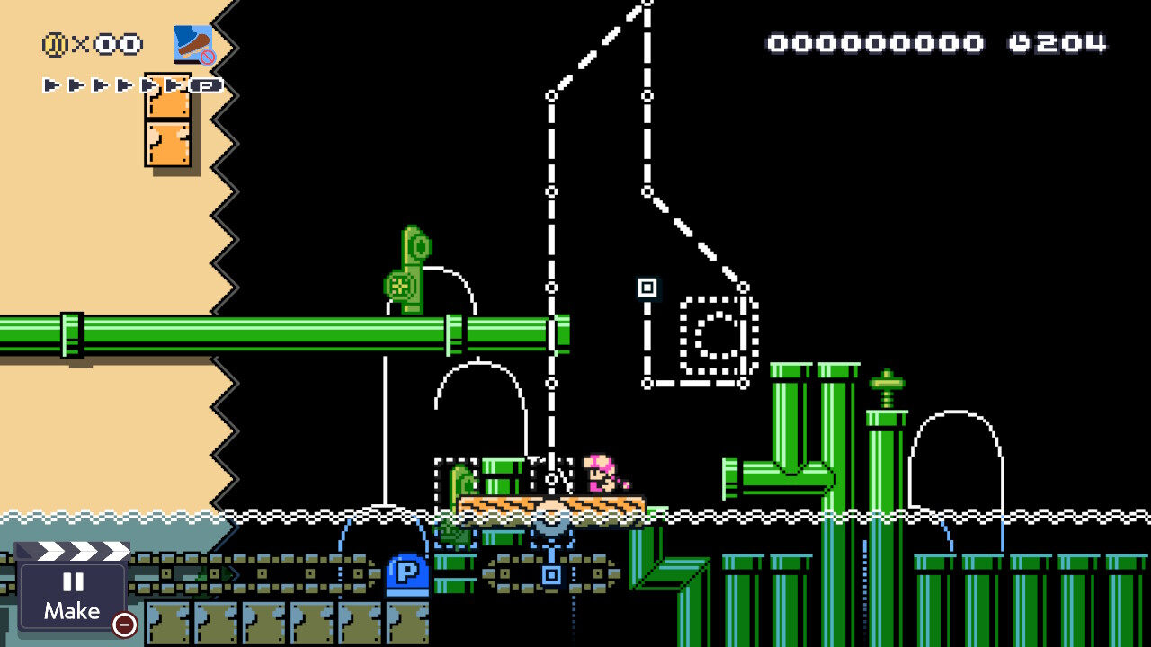A Super Mario Maker 2 level with green pipes, tracks and a moving platform